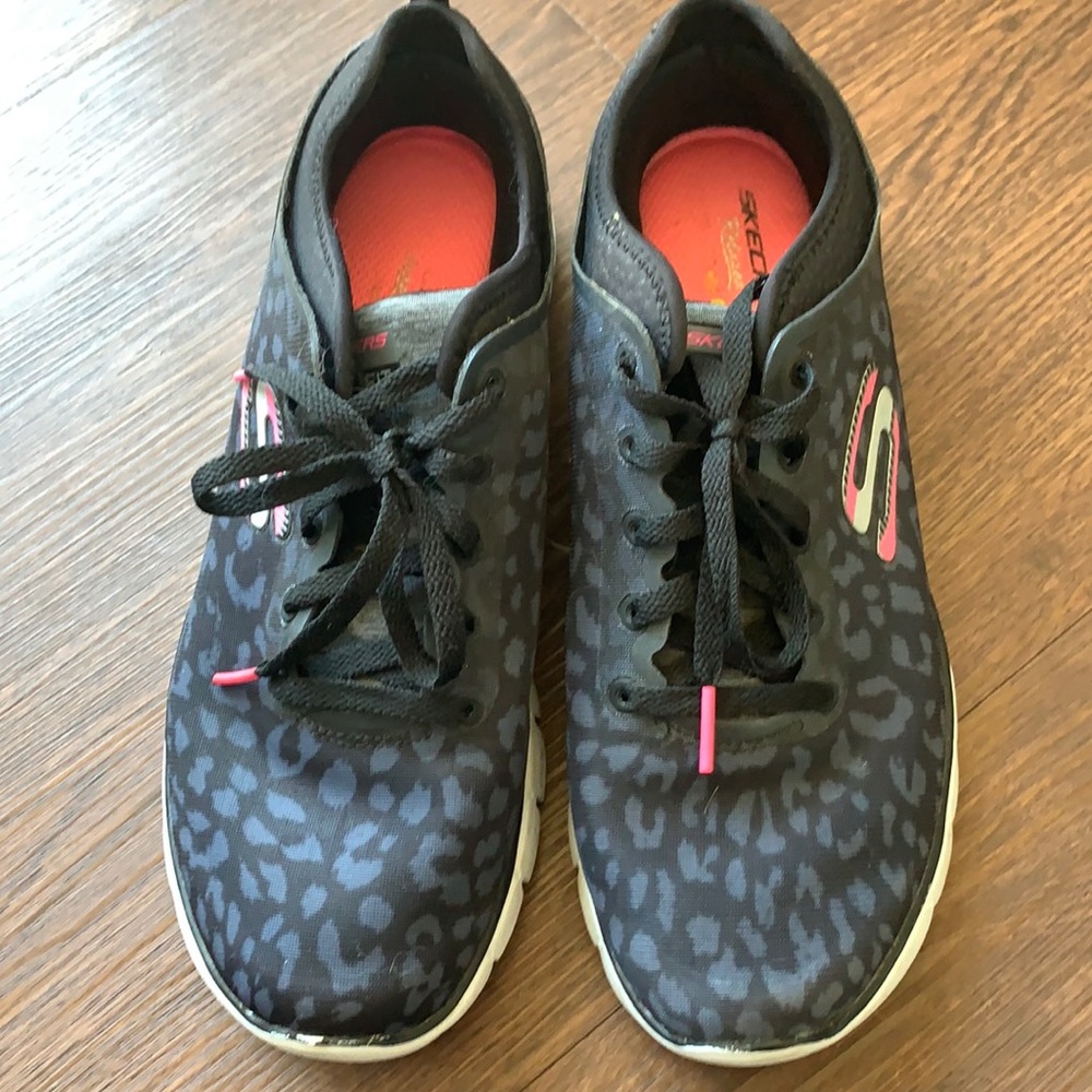Black leopard print Skechers sneakers